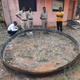 A view of the 9-foot-wide metal ring that fell onto western rural India.